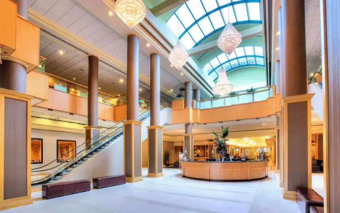 Large lobby at the Florida hotel featuring a vaulted ceiling and large skylight.