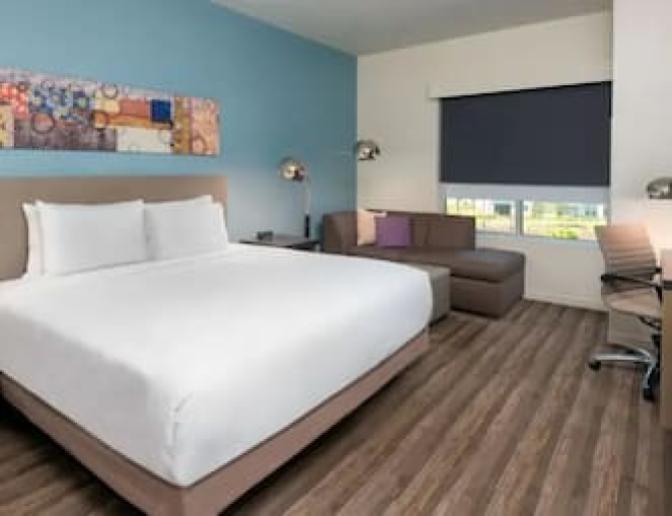 A room that has two Queen beds at the Hyatt House near Orlando International Airport