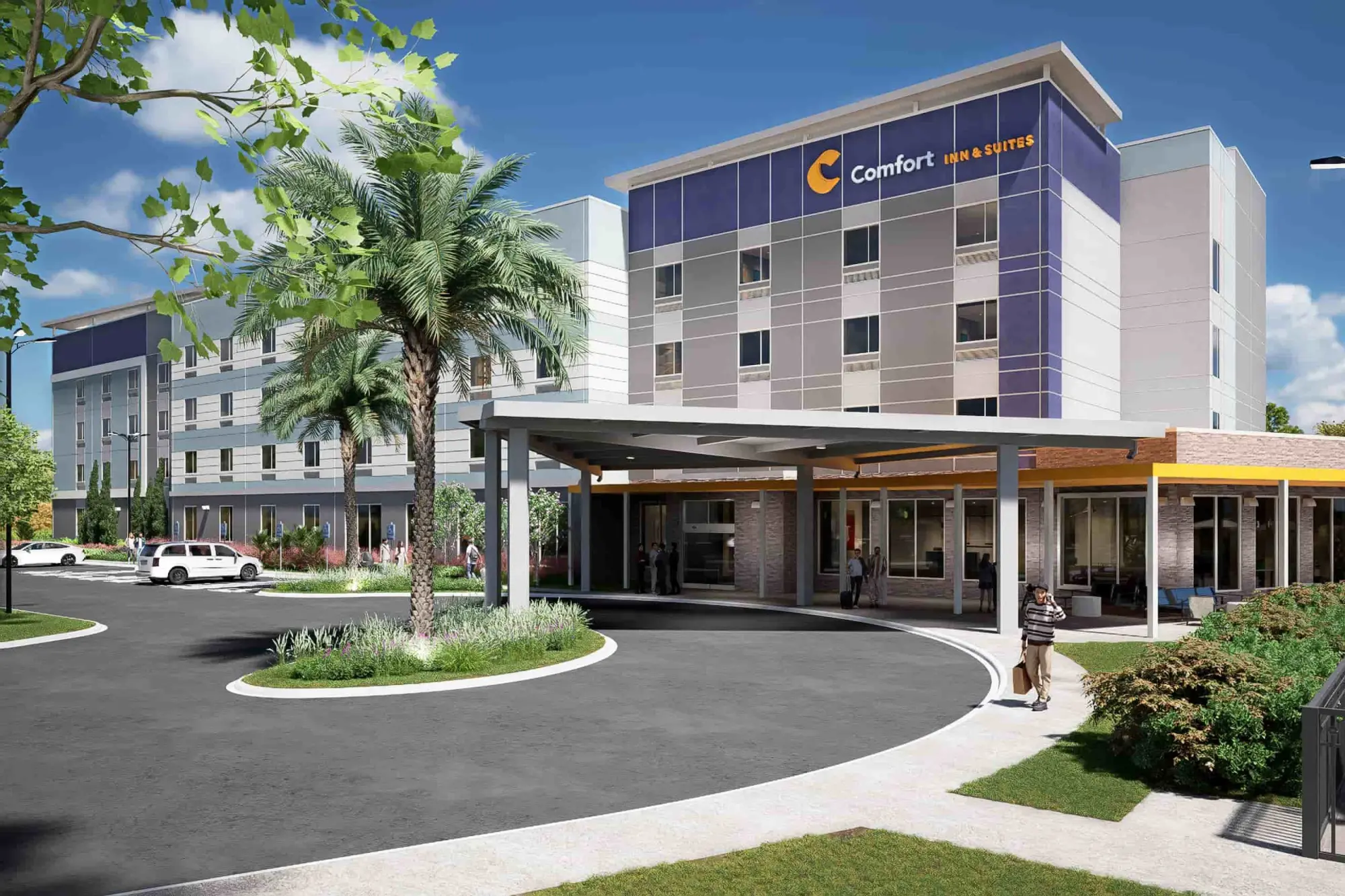 Exterior view of Comfort Inn & Suites Sanford hotel featuring a modern entrance and large palm trees.
