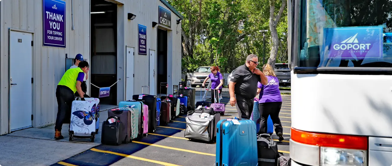 Go Port bus loading luggage at the Go Port Plaza.